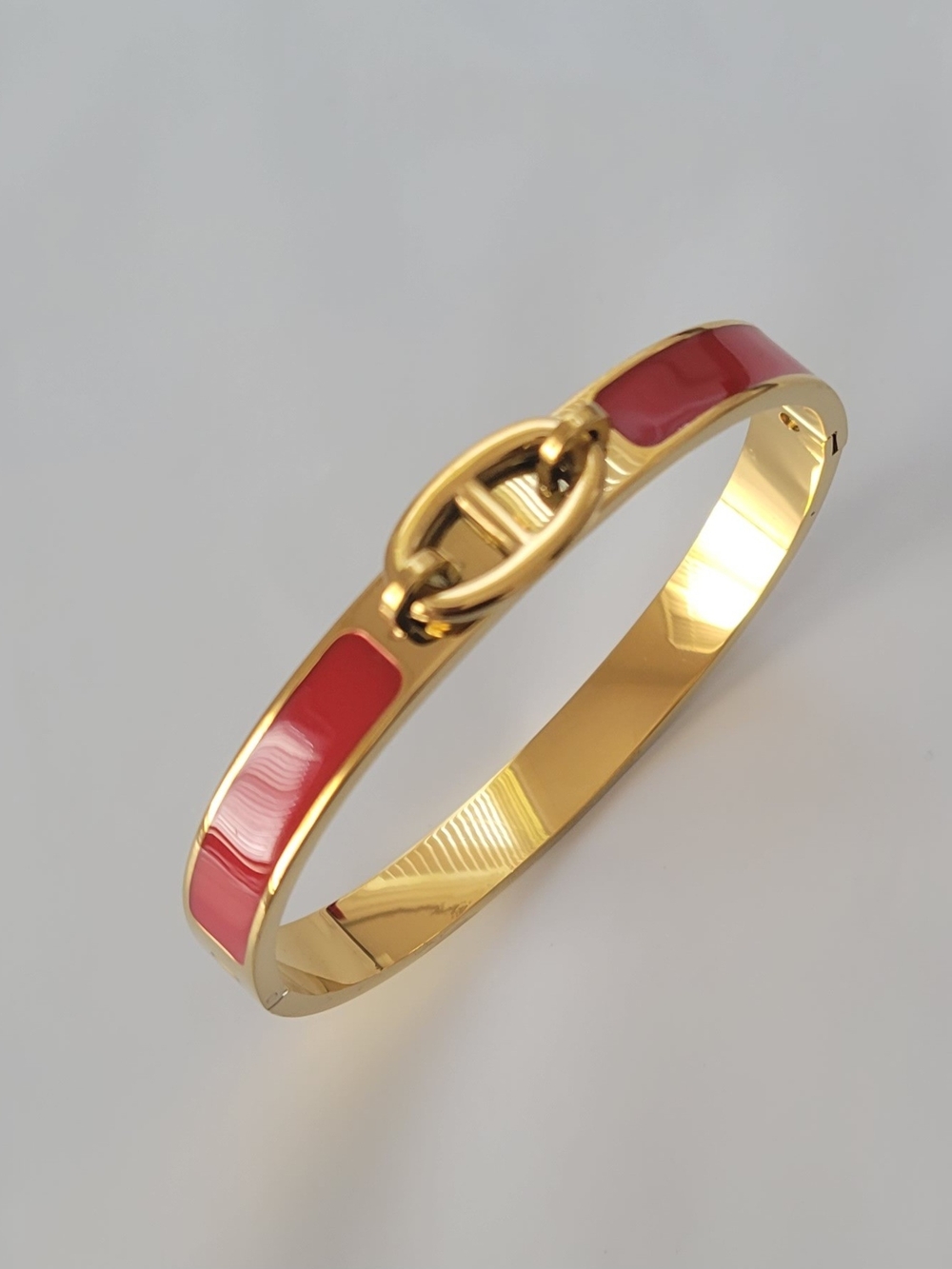 Gold-tone Bangle Bracelet with Gray Enamel Inlay